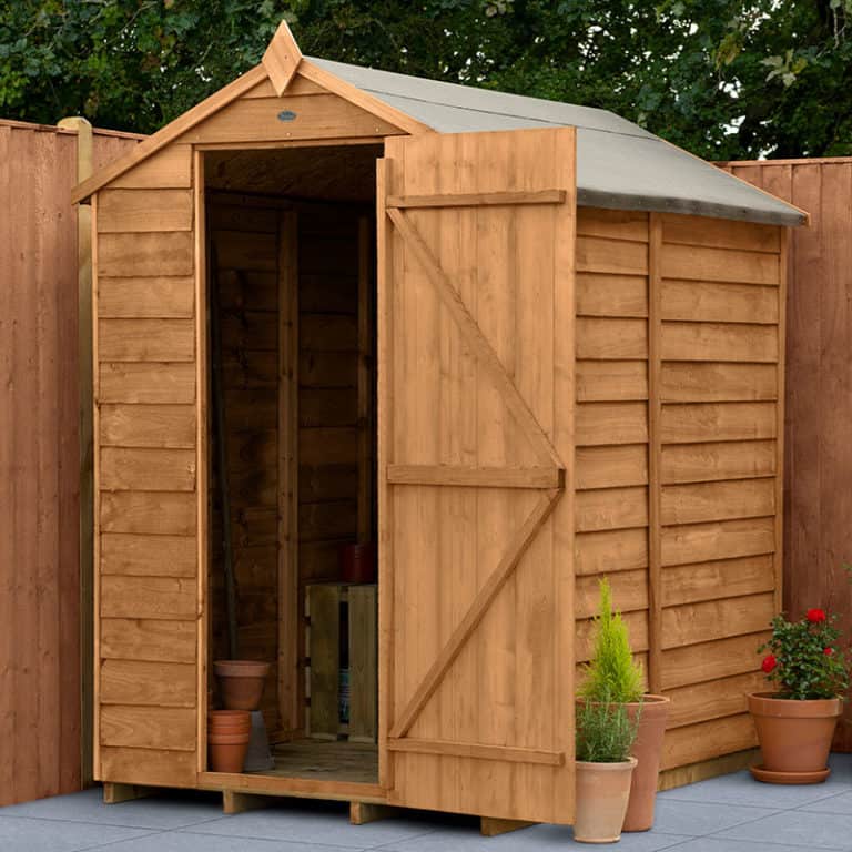 6x4 Forest Overlap Dip Treated Windowless Apex Wooden Shed for outdoor storage and garden use.