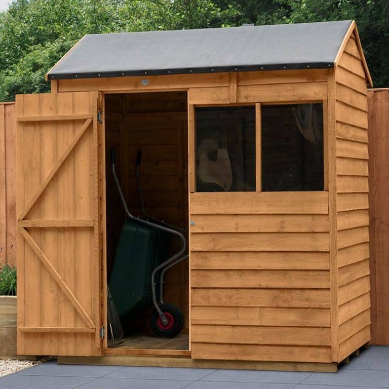 6x4 Forest Overlap Dip Treated Reverse Apex Wooden Shed with sturdy design and natural wood finish.