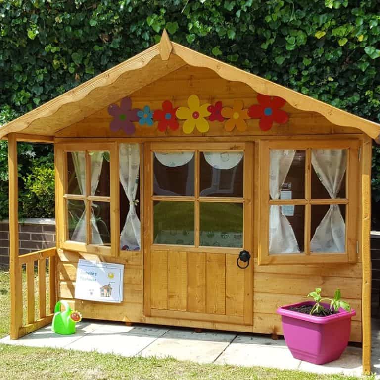 6 x 6 wooden playhouse with a charming design