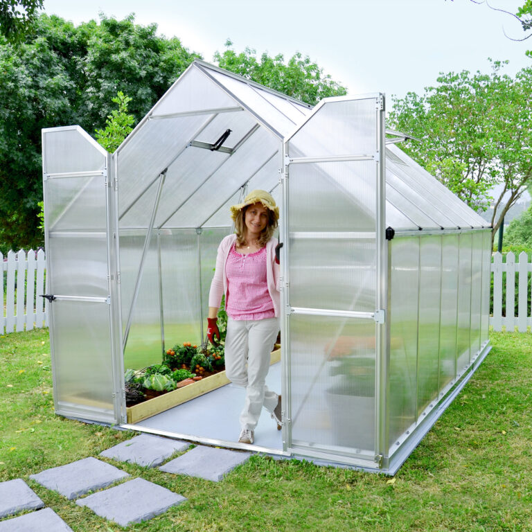 8'x12' Palram Canopia Essence greenhouse with aluminum frame for gardening and plant growth.