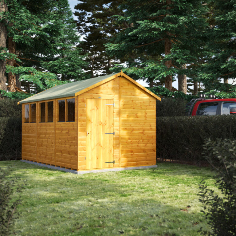 A sturdy and stylish Oren 12' x 8' Shiplap Modular Custom Apex Shed in a garden setting.