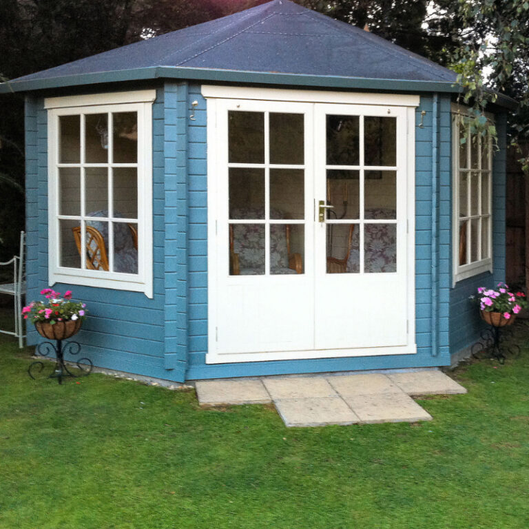 Loxley 3m x 3m Adlington Corner Log Cabin with toughened glass windows and double doors.