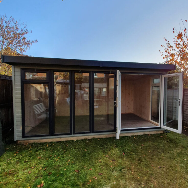 Bards 14' x 10' Othello Bespoke Insulated Garden Room Painted with double doors and windows.