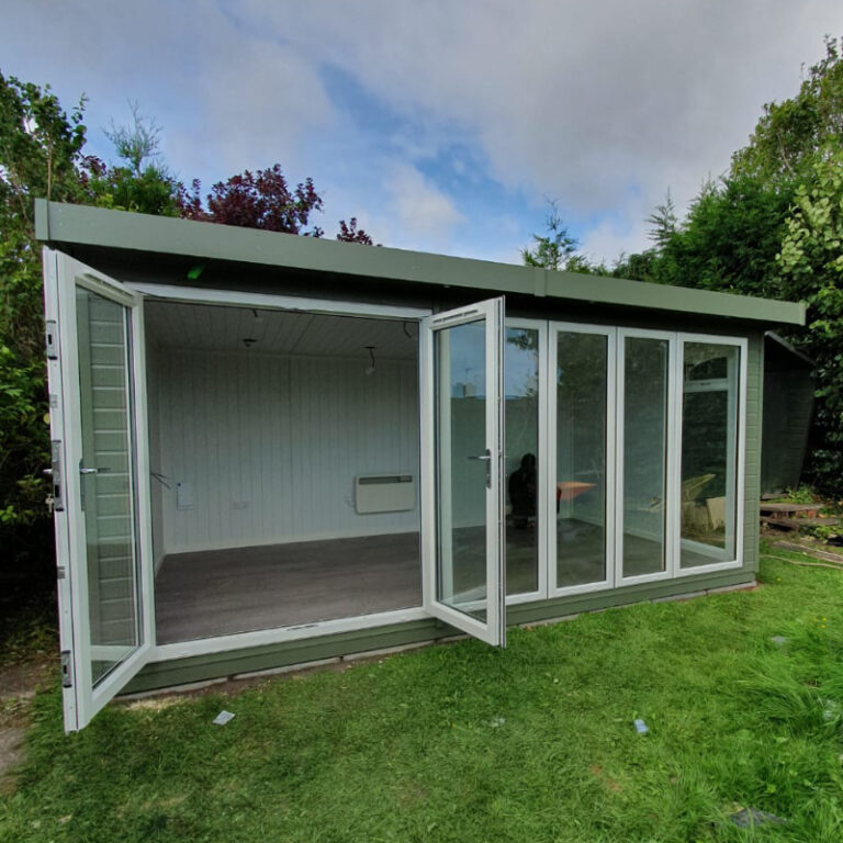 Bards Othello 18' x 12' Insulated Garden Room in a stylish setting.