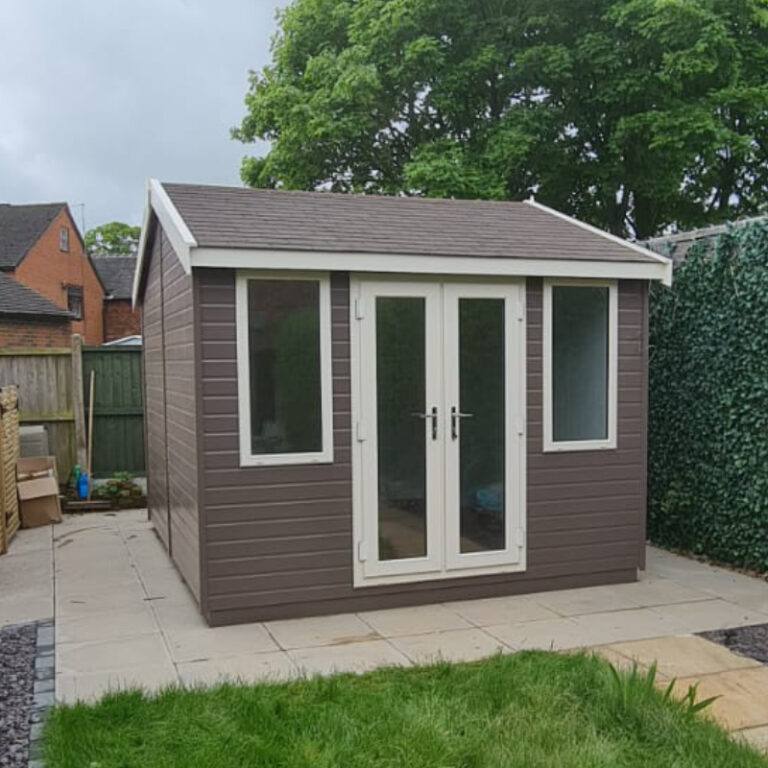 Bards 12' x 8' Portia Bespoke Insulated Garden Room with double doors and a traditional roof design.