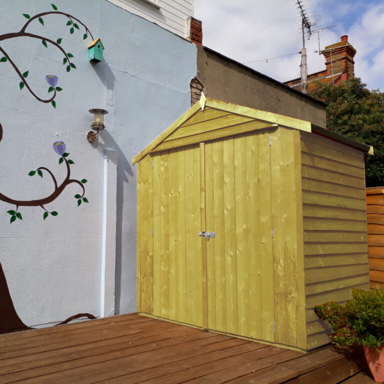 Loxley 4' x 6' Pressure Treated Overlap Apex Shed featuring a durable mineral felt roof and protective cladding.