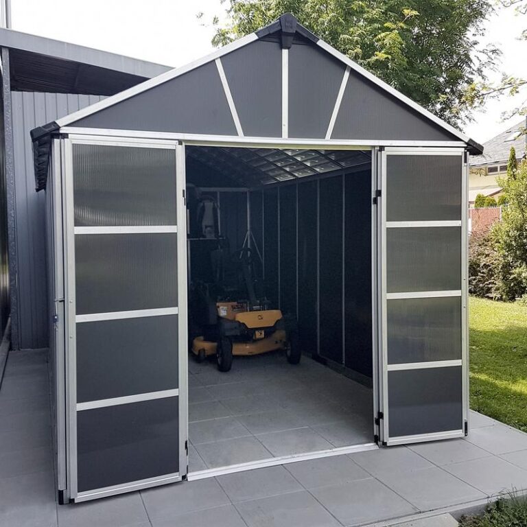 Palram Canopia 11' x 17' Yukon Dark Grey Shed with an apex roof design.