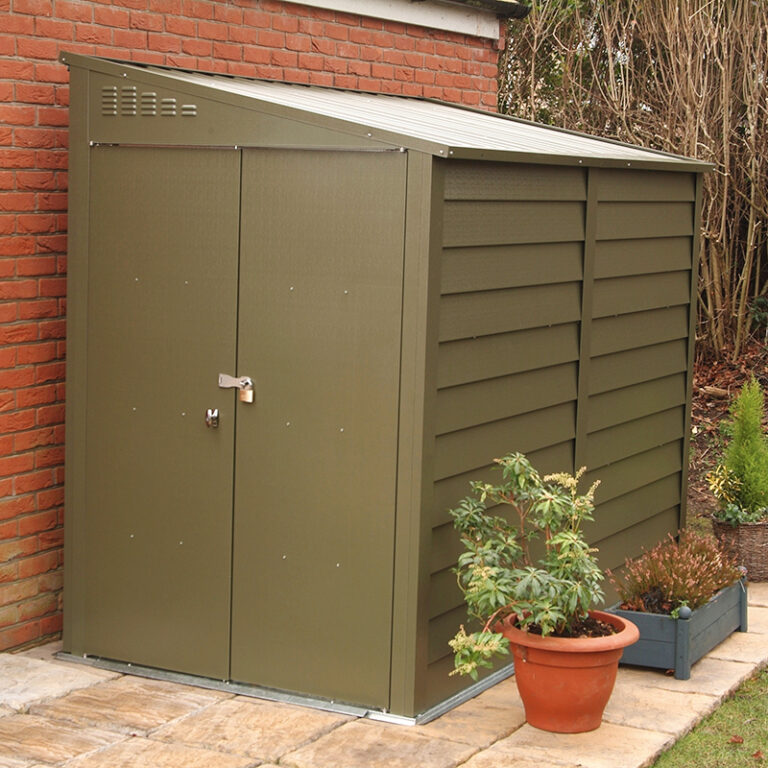 Trimetals 9' x 4' Metal Shed captured in a garden setting