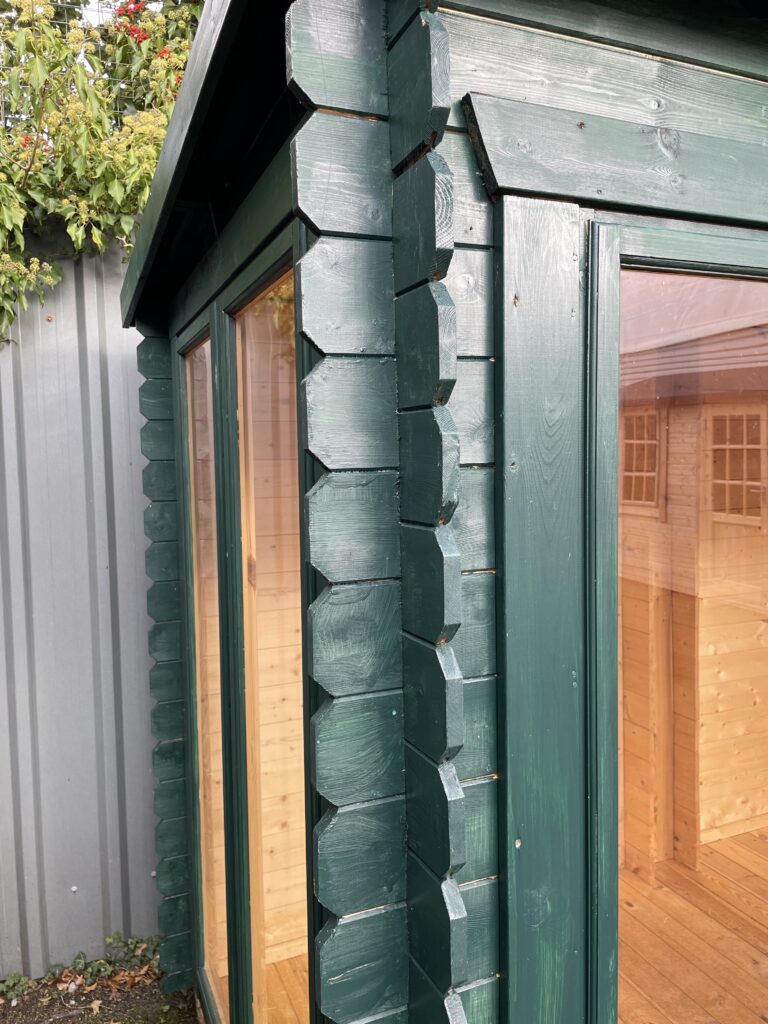 Close-up of green timber corner joints