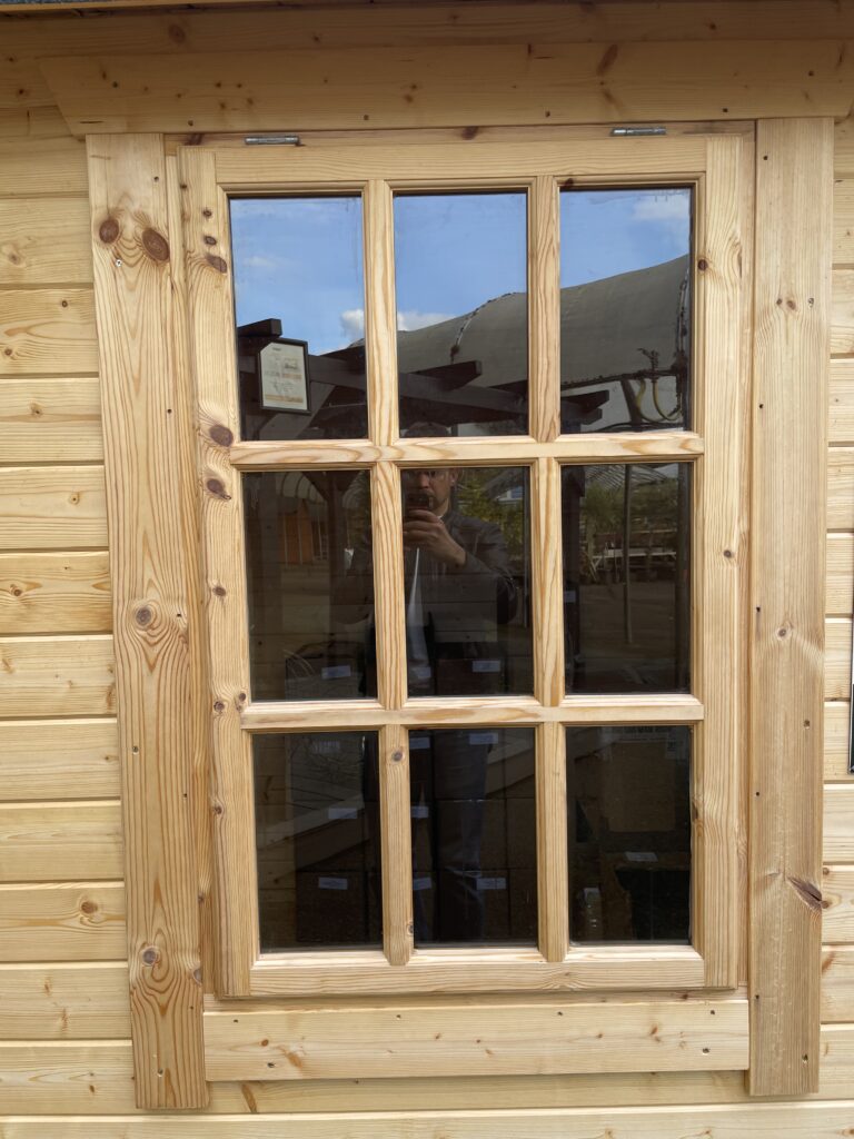 Georgian-style half-pane timber window with clear glass