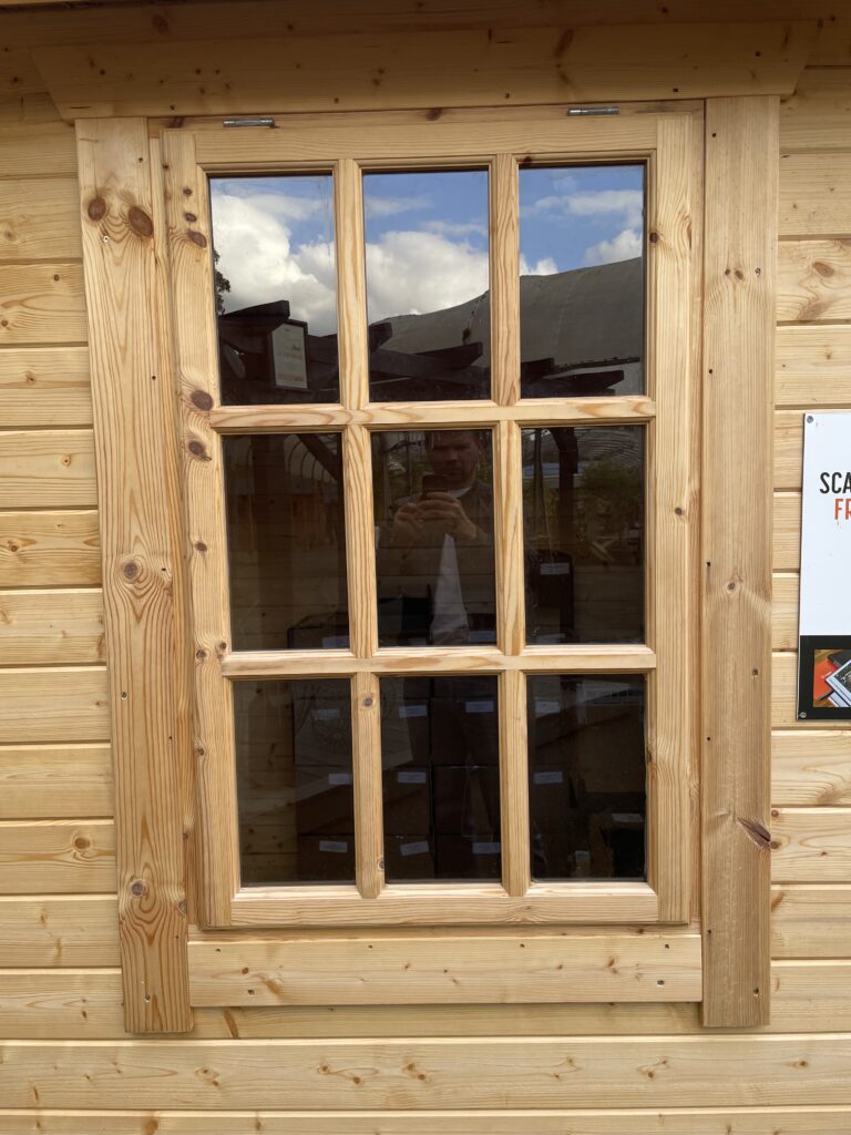 Georgian-style half-pane timber window with clear glass