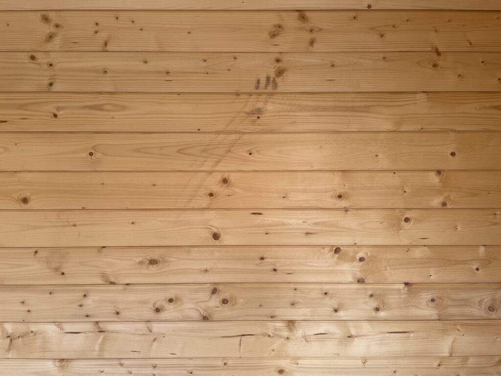 Interior view of timber wall cladding showcasing smooth finish and natural grain