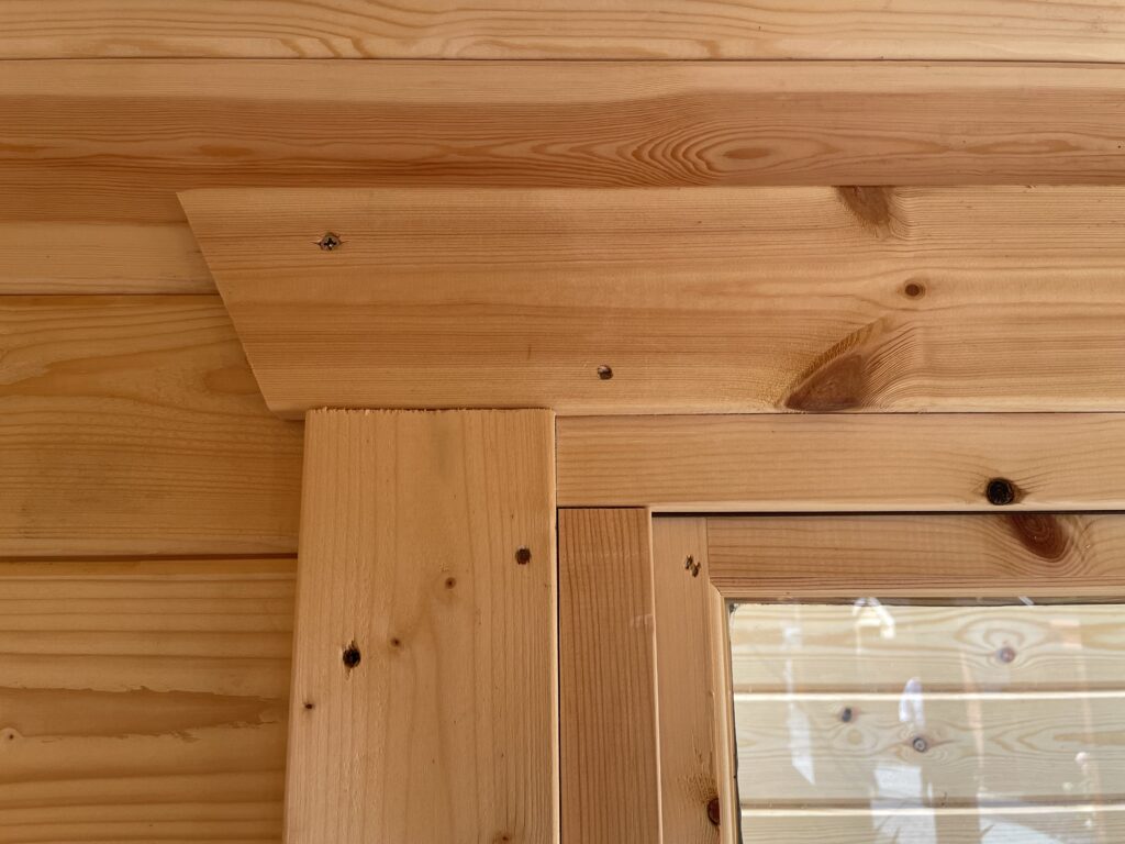 Close-up of timber joinery in a garden building