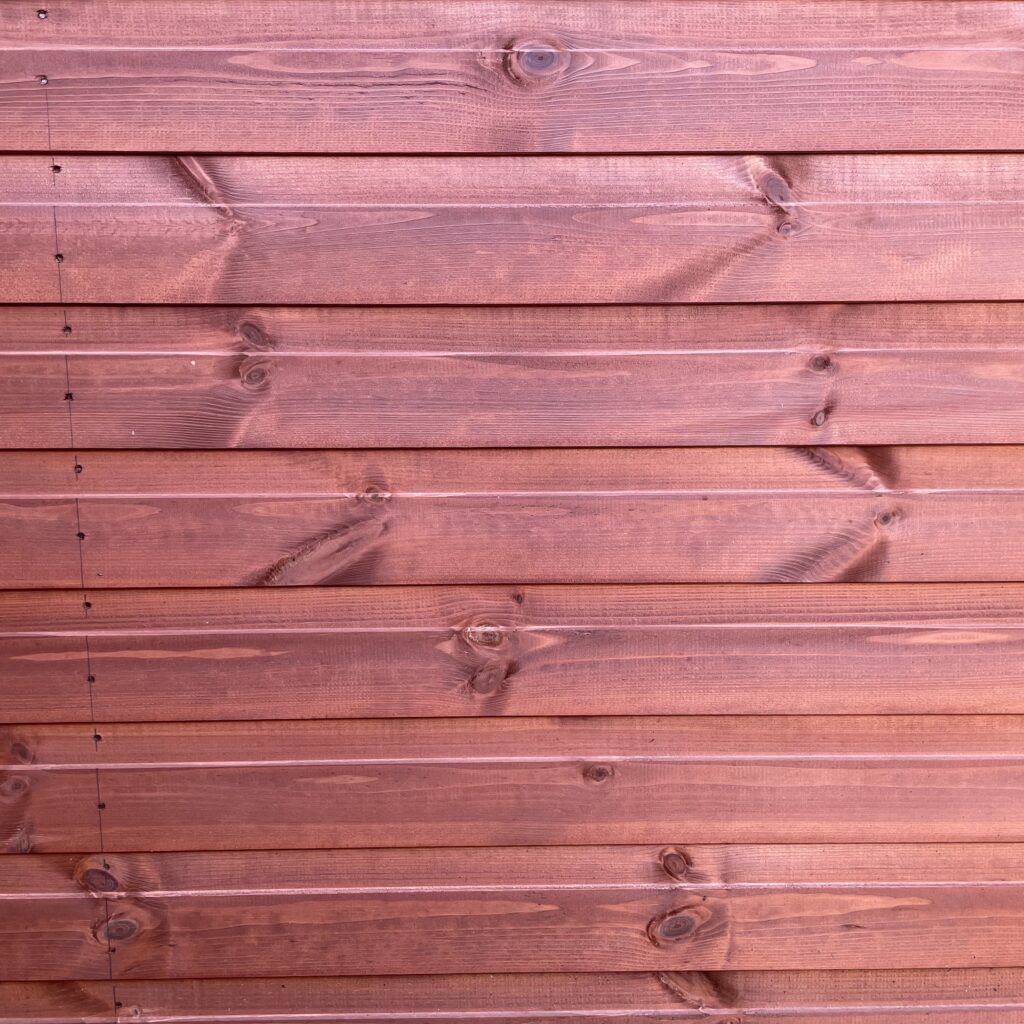 Close-up of the T&G cladding boards showcasing wood texture