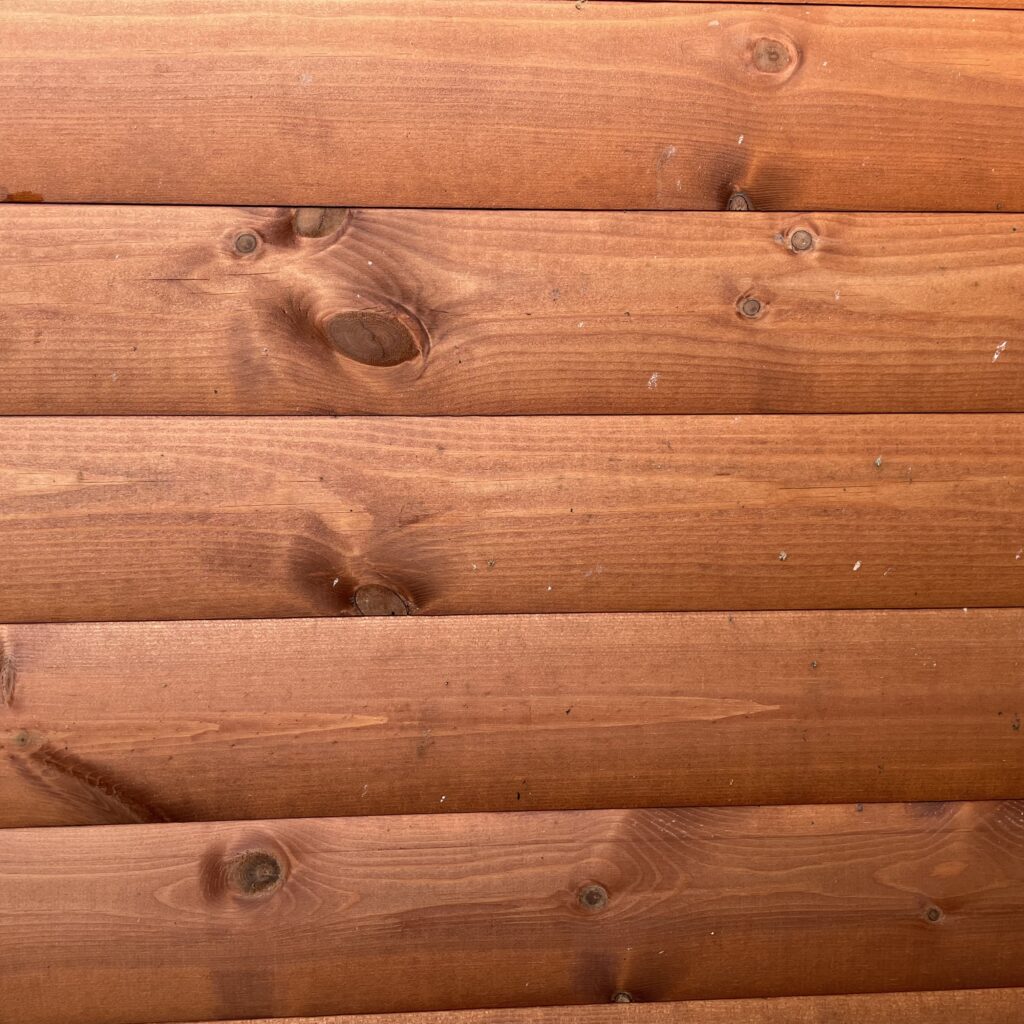 Loglap wooden cladding boards in a warm finish
