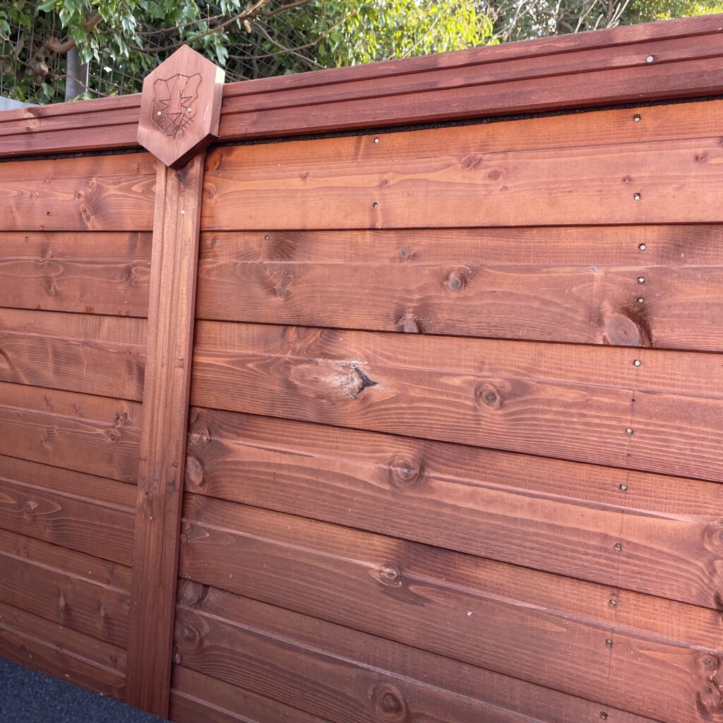 Close-up of wooden cladding with decorative feature from Tiger