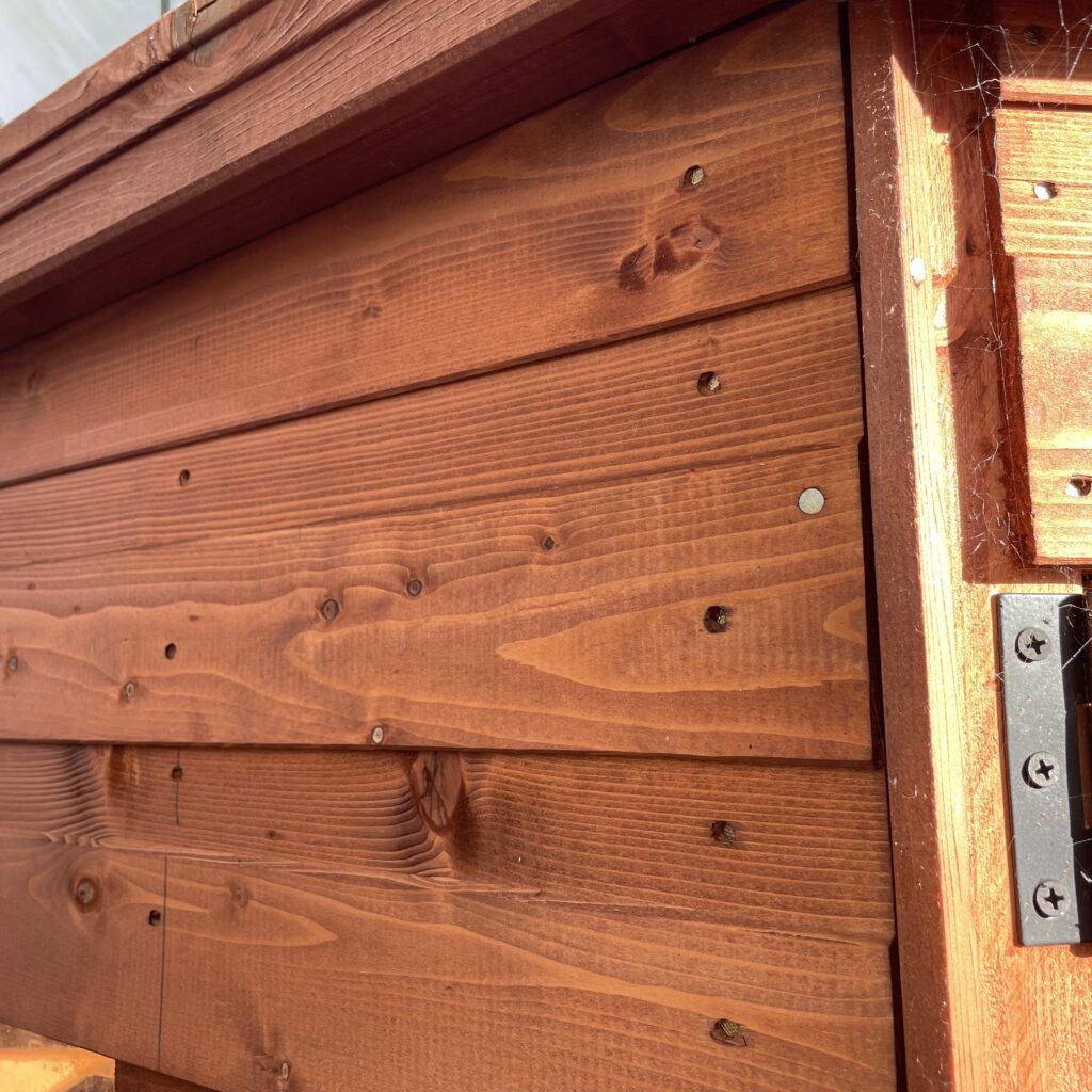 Close-up of the corner joints and cladding of a Tiger Corner Summerhouse