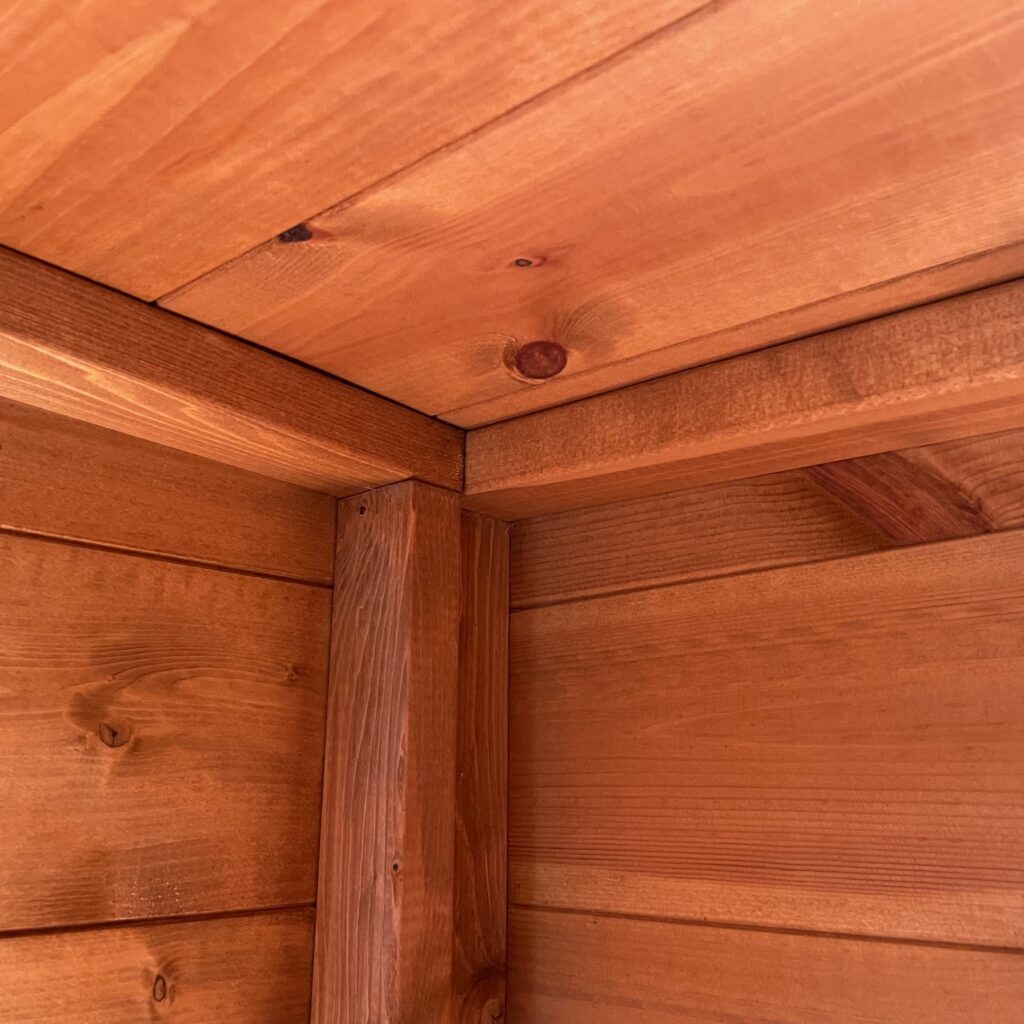 Close-up of corner joint in a wooden summerhouse