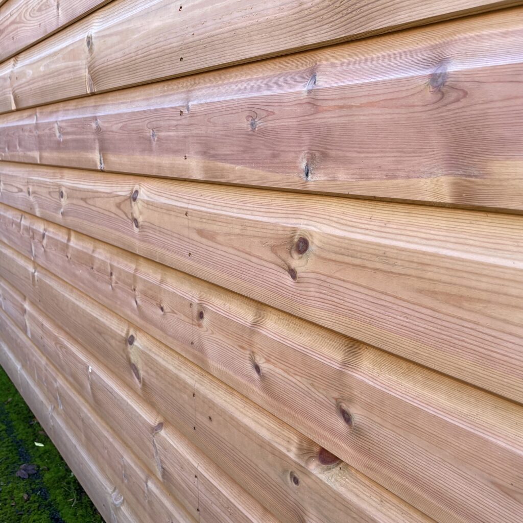 Close-up of the cladding on the Tiger Elite Pressure Treated Apex Shed