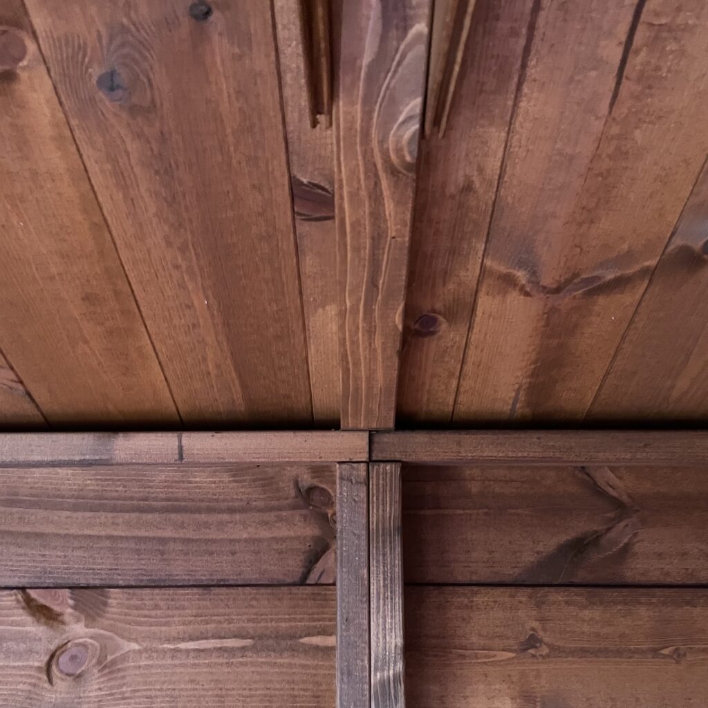 Interior view showcasing tongue and groove wooden ceiling joints