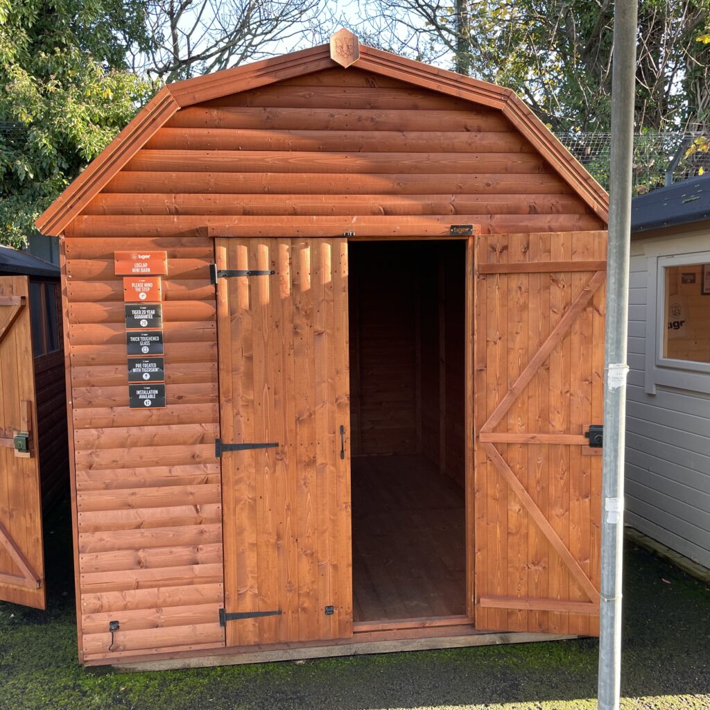 Front view of the Tiger Loglap Mini-Barn featuring double doors