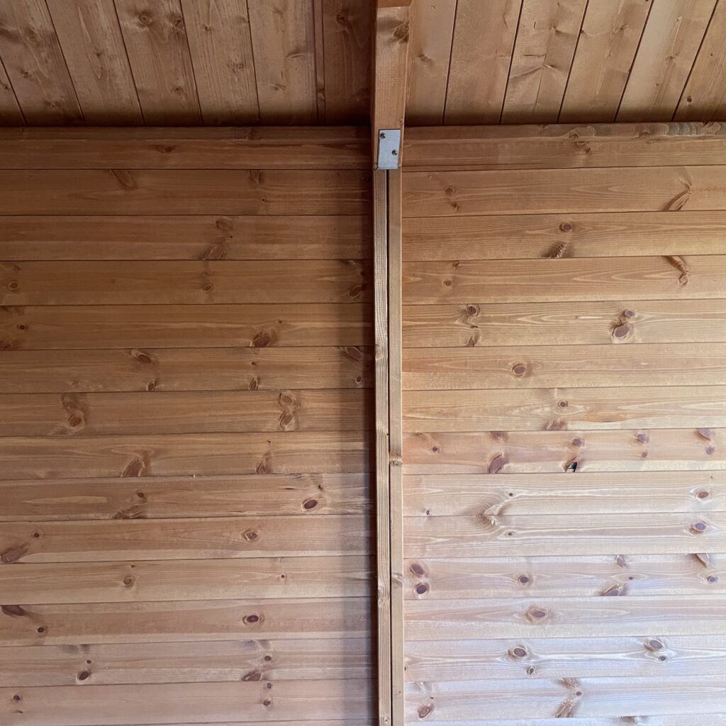Interior wall joinery showcasing smooth timber cladding