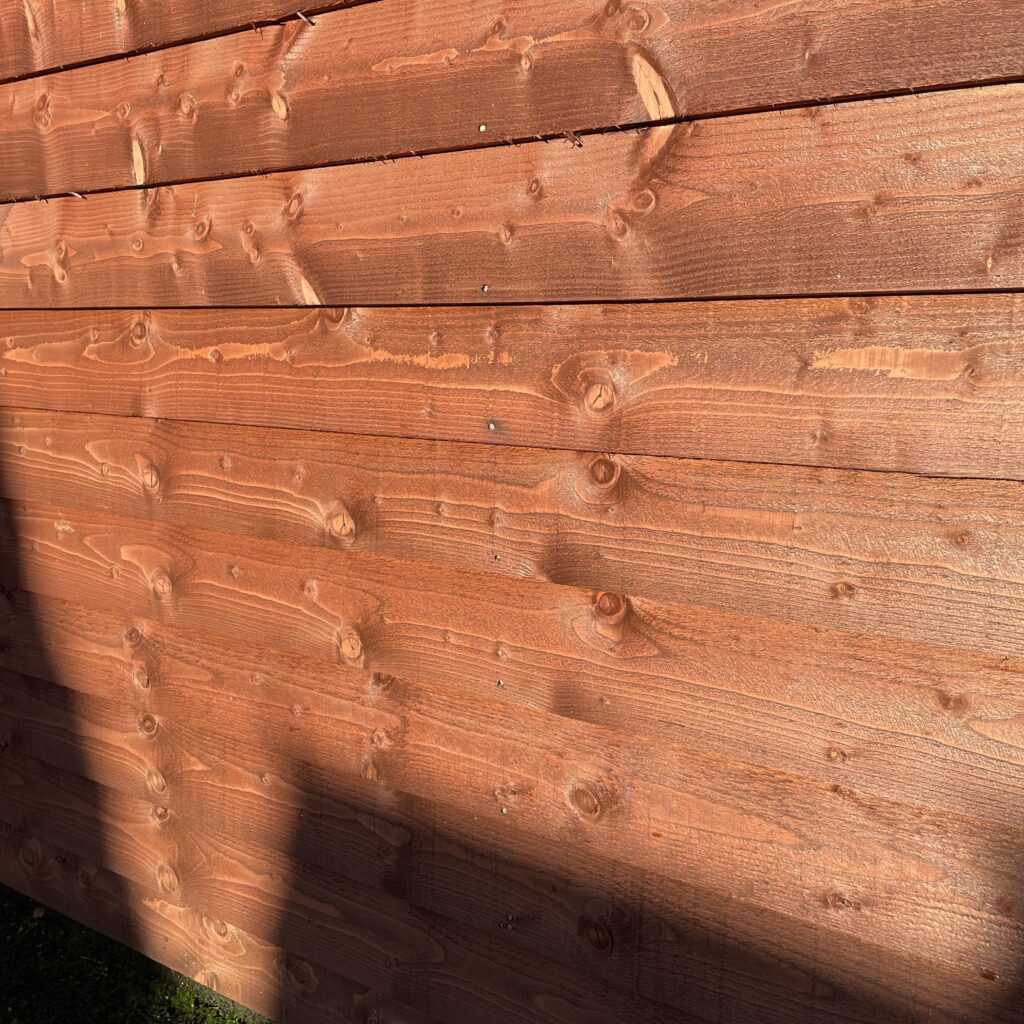 Close-up of the overlap cladding on a Tiger Apex Shed