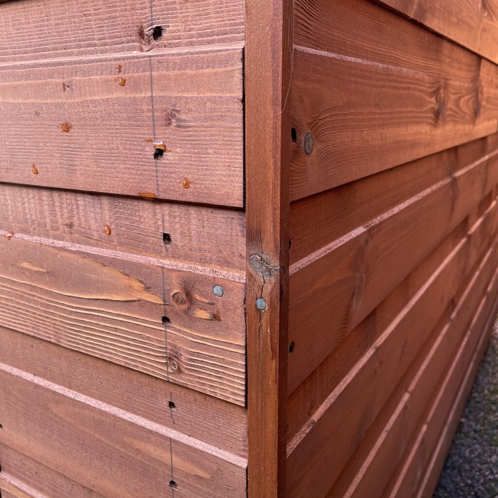 Corner joint and cladding of a Tiger Pent Bike Shed