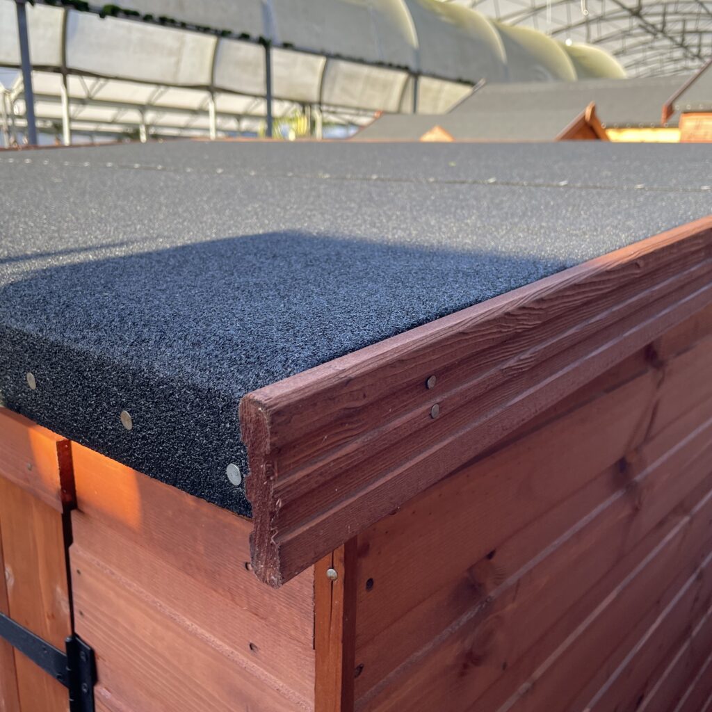 Pent roof of a Tiger bike shed with felt covering
