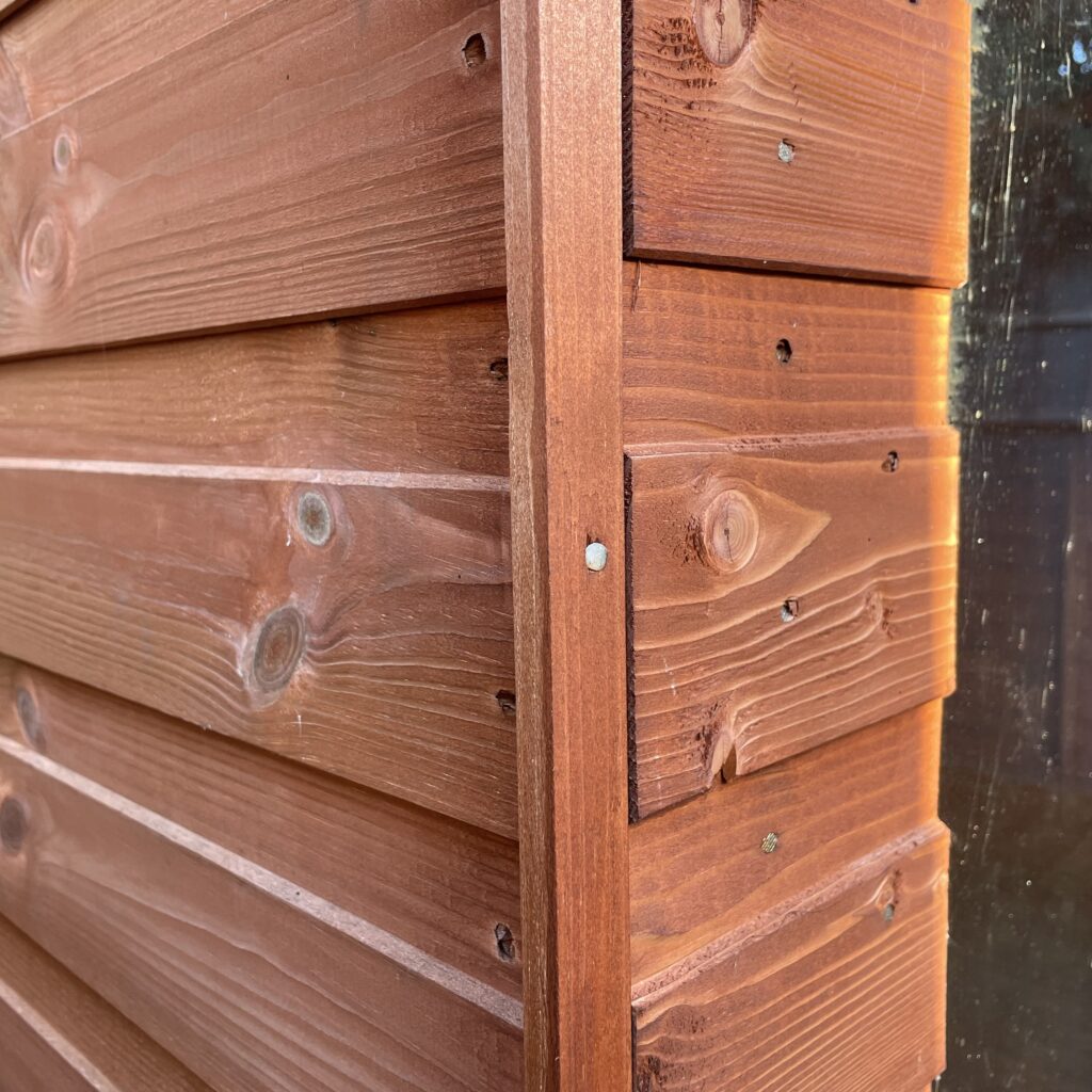 Detailed view of the wooden cladding on a summerhouse