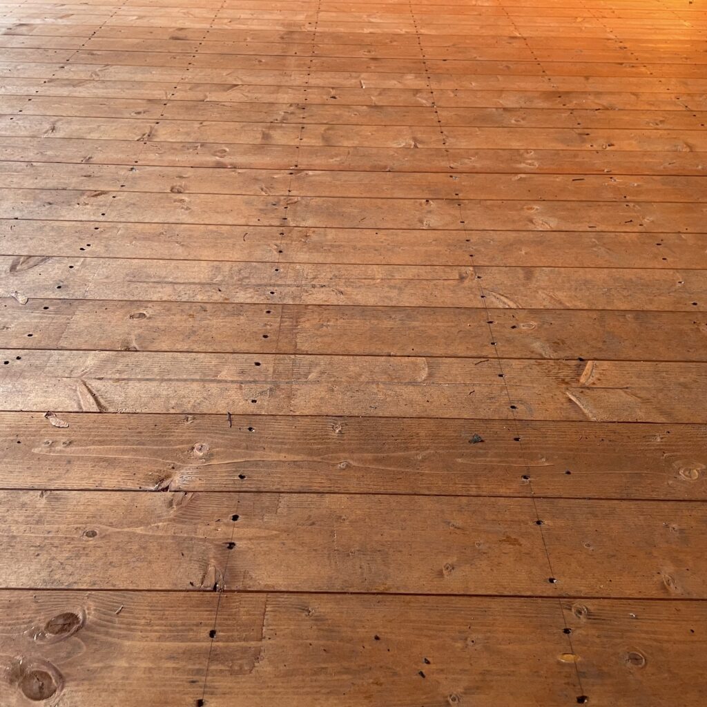 Interior view of a wooden floor in a summerhouse