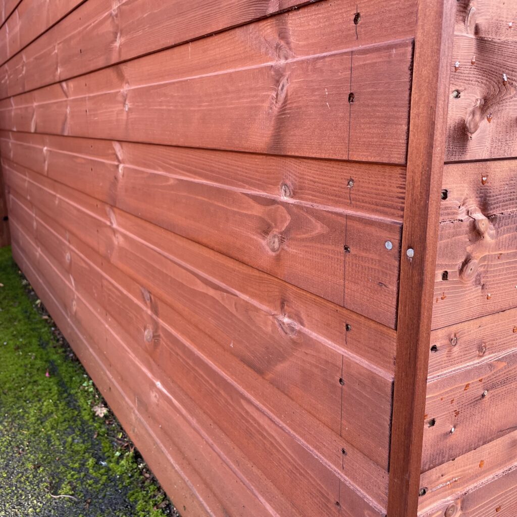 Close-up of the shiplap cladding on a Tiger Apex Shed