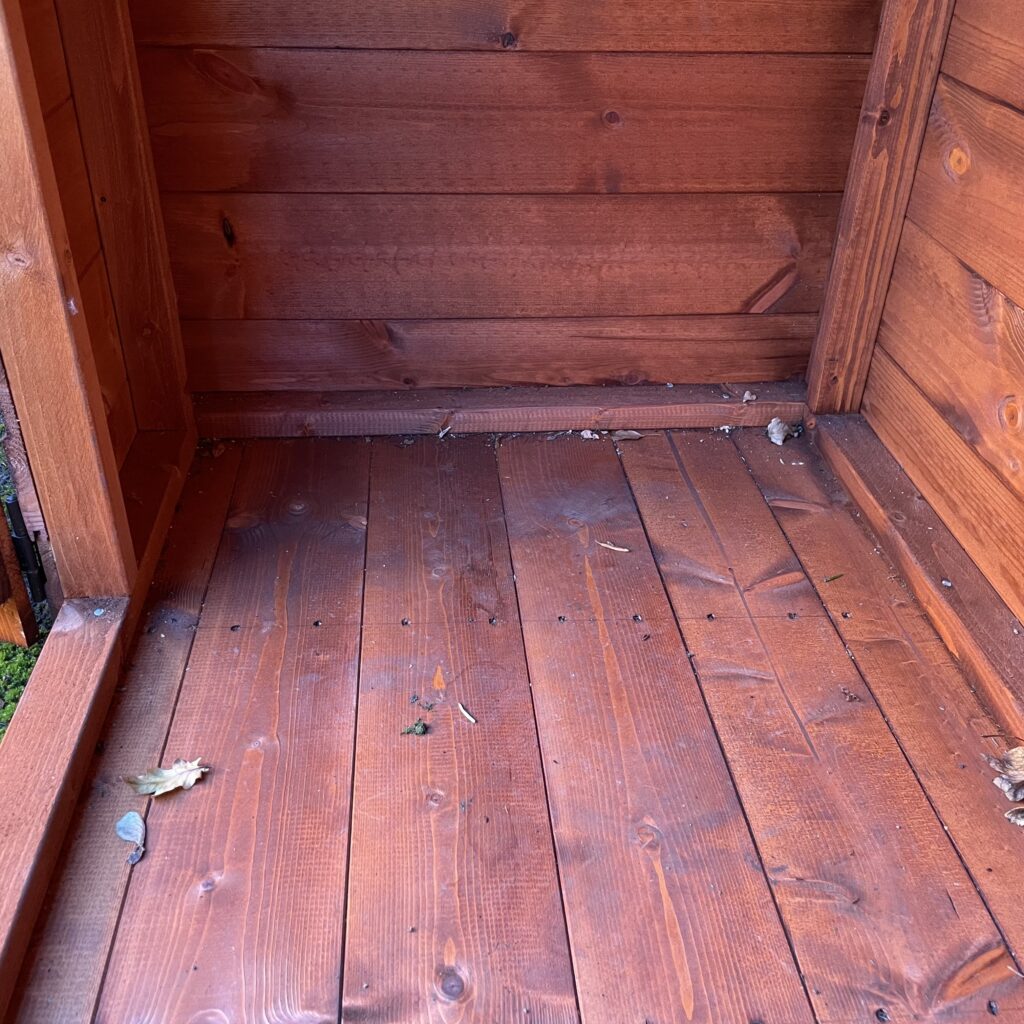 Interior view of the Tiger Storbox with wooden floor and walls