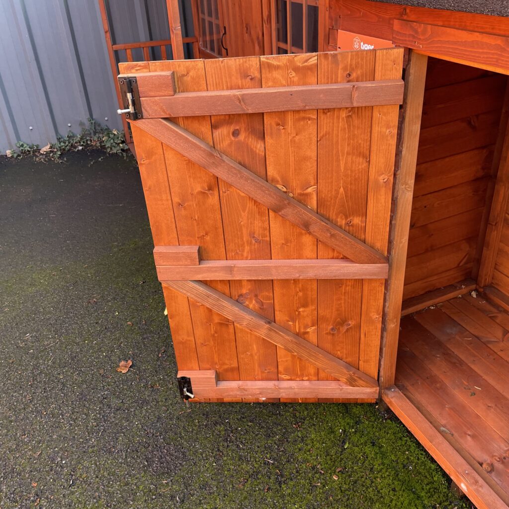 Open door of a Tiger Storbox showing sturdy wooden construction