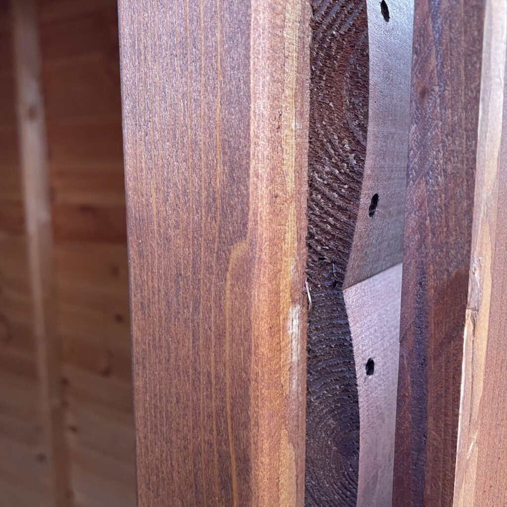 Detailed view of timber joinery in a garden building