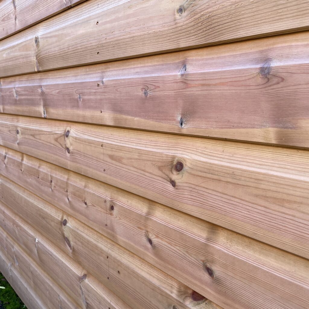 Close-up of timber cladding showing quality craftsmanship