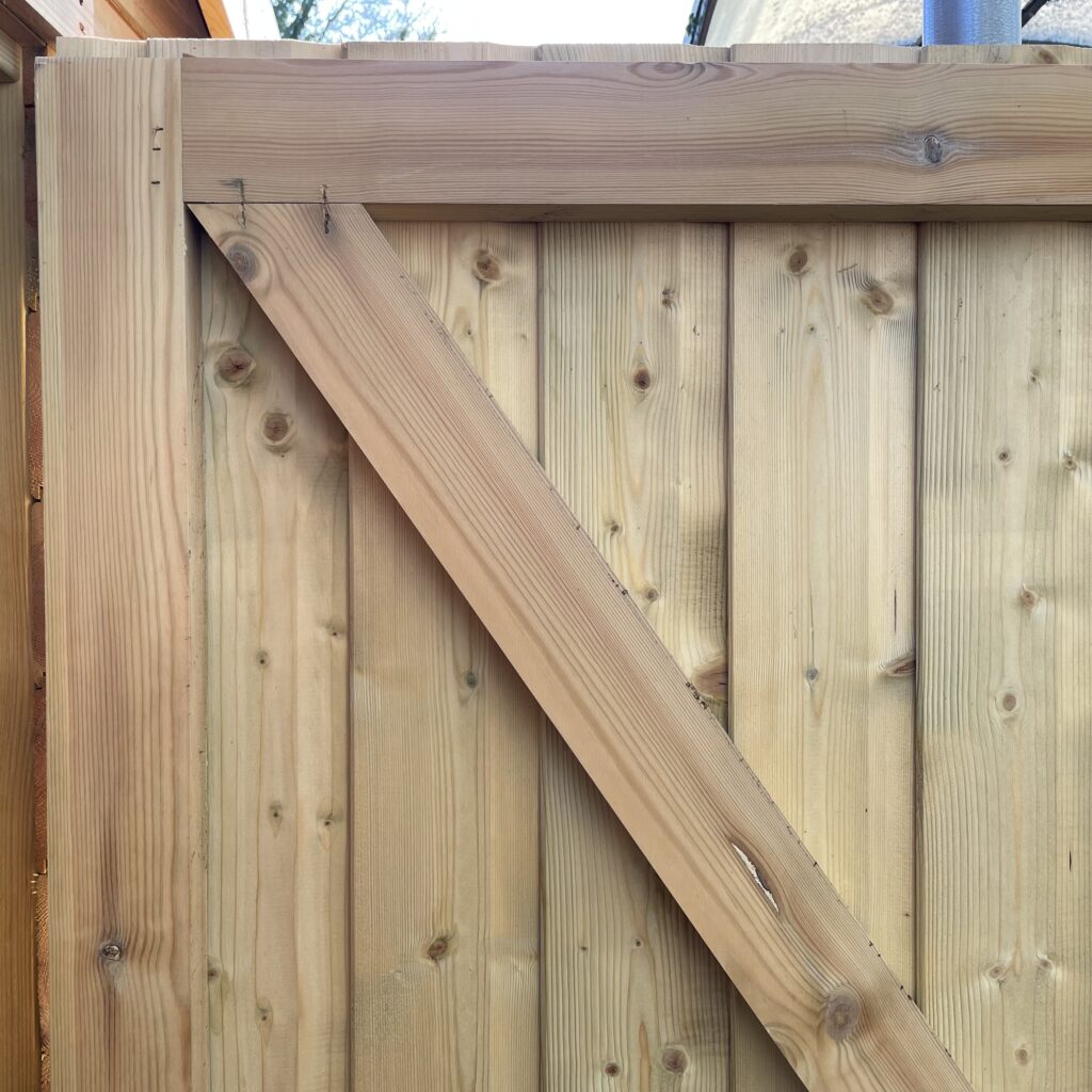 Timber cladding with diagonal bracing detail