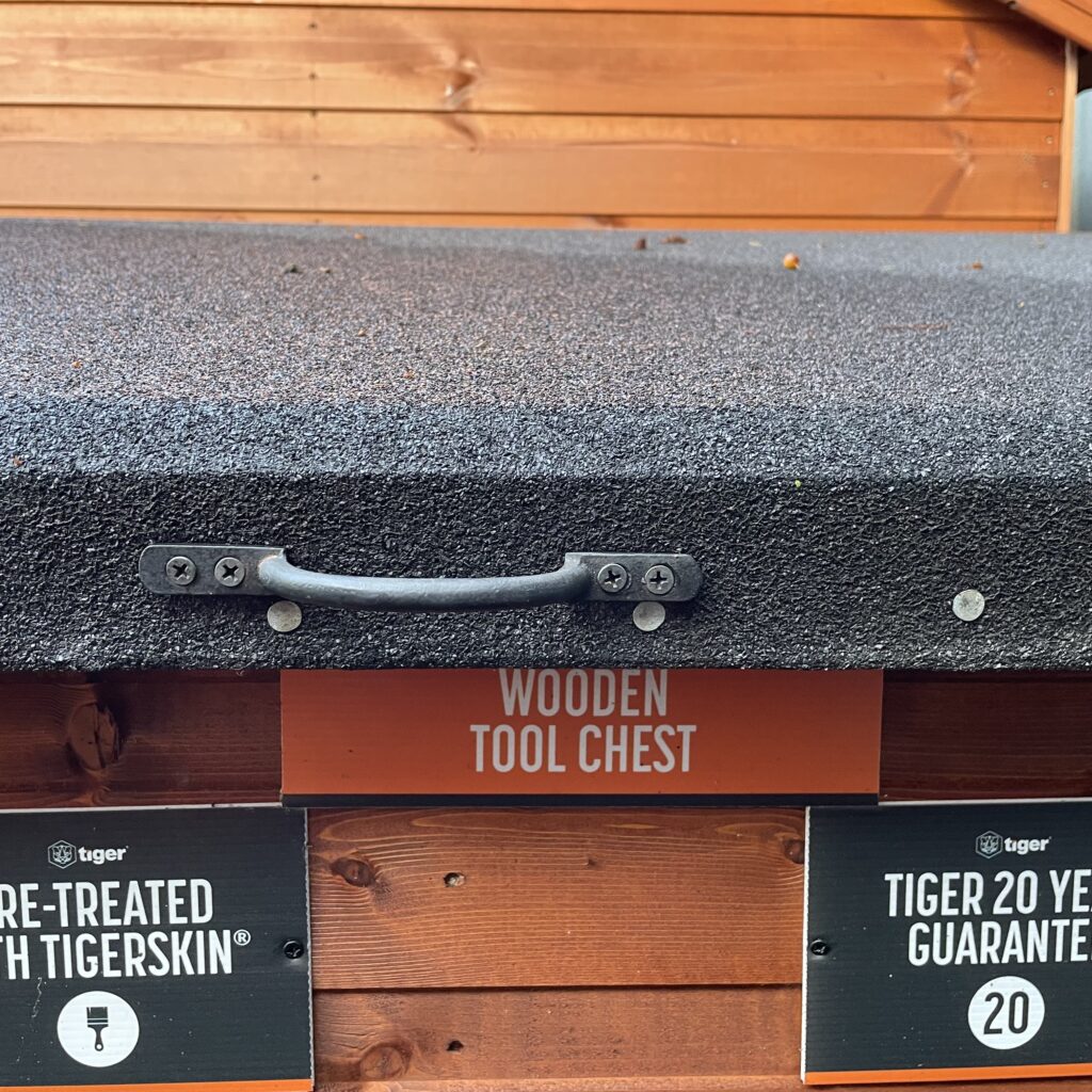 Top view of the Tiger Wooden Tool Chest with a textured surface and handle