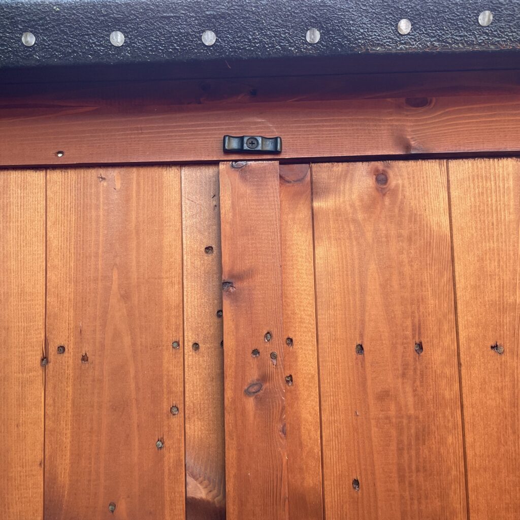 Close-up of wooden cladding showcasing joinery and fastening details