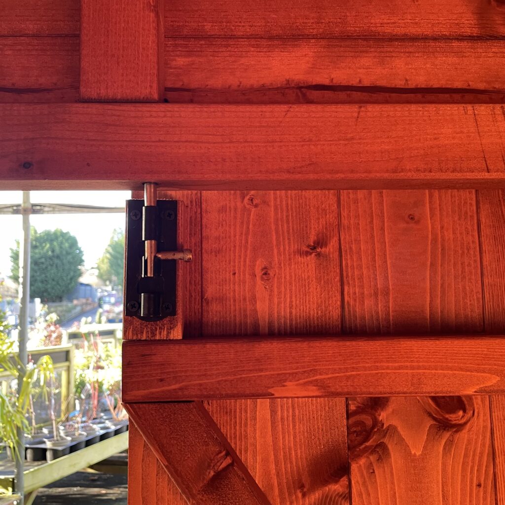 Close-up of the sturdy hinge on the Tiger XL Heavyweight Workshop door