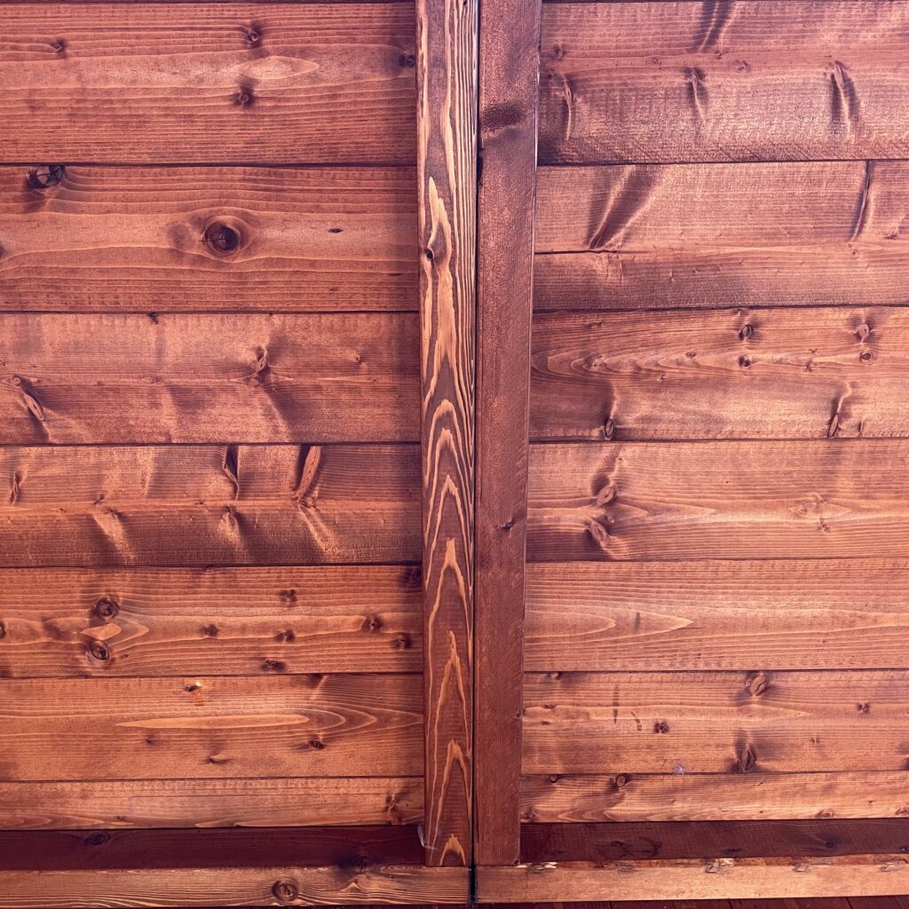 Close-up of brown timber cladding on a garden building