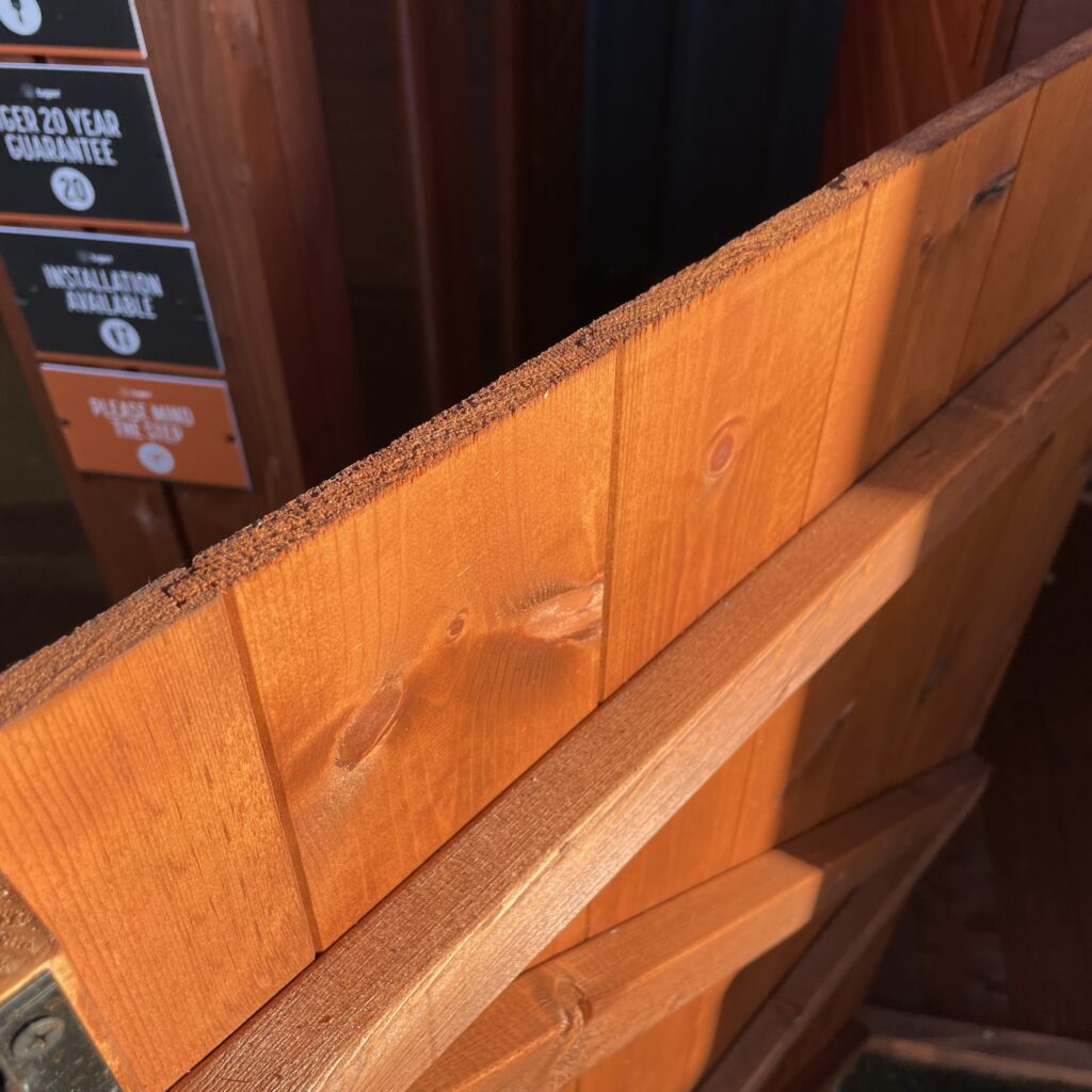 Close-up of the wooden door of the TigerFlex Apex Bike Shed