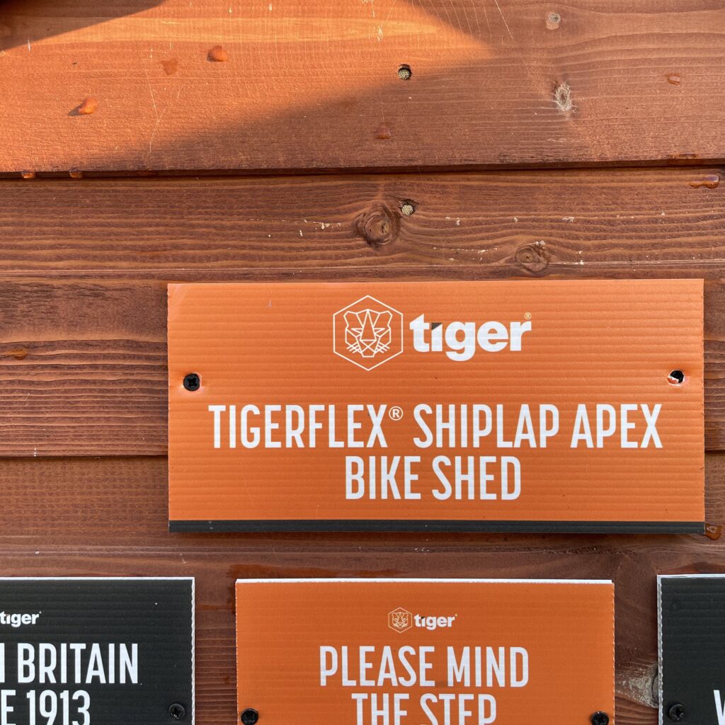 TigerFlex Apex Bike Shed displayed at a show site