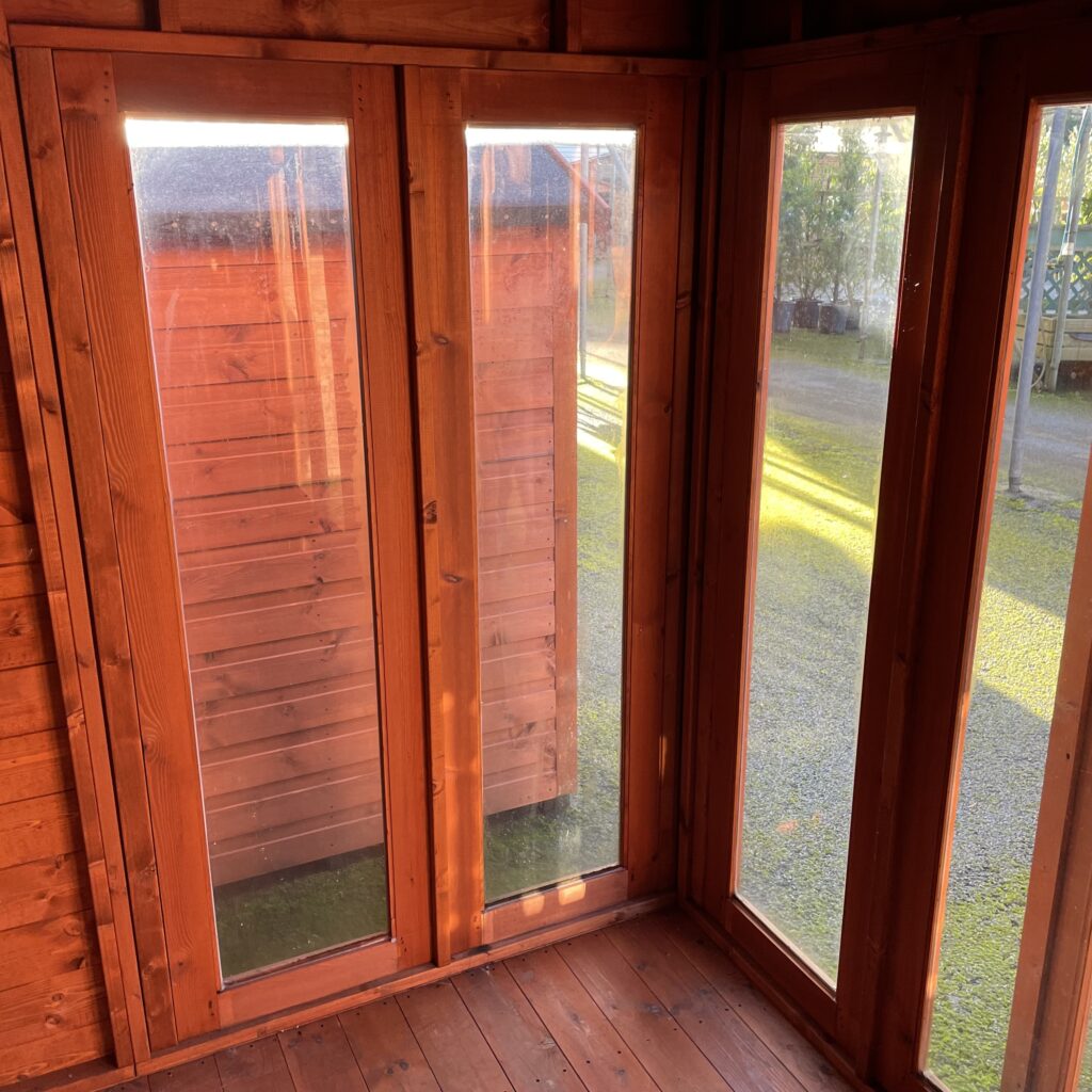 Interior view of full-pane windows in a summerhouse