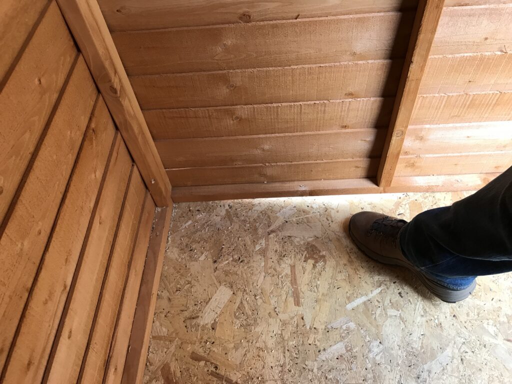 Cheaper alternative showing the poor quality OSB flooring. This picture also shows the floor sagging underfoot as I walked towards the edge.